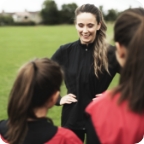 Mother coaches a soccer team
